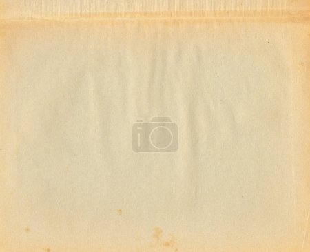 Téléchargez les photos : Page jaunie de vieux livre de papier vintage avec des taches de texture de fond. Numérisation haute résolution. - en image libre de droit