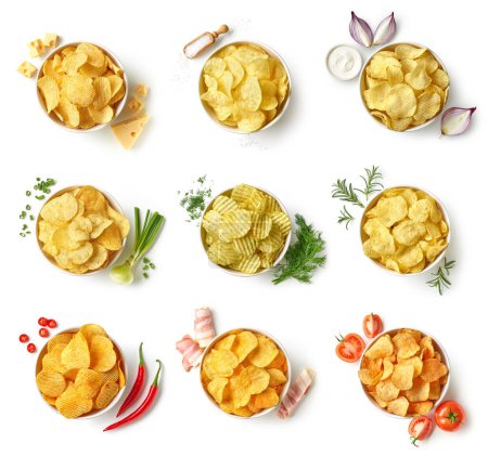 Photo for Set or collection of different flavor potato chips or crisps in bowls with fresh ingredients. Salt, onion, sour cream, cheese, spring onion, bacon, dill, thyme, chili pepper and tomato. - Royalty Free Image