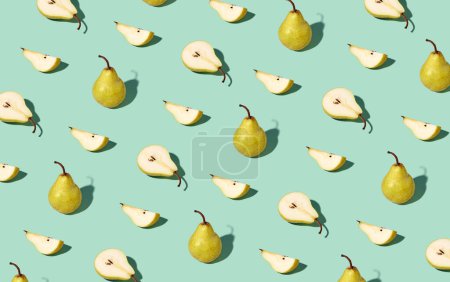 Photo for Colorful pattern of fresh ripe whole and sliced pears. Minimal trendy sunlight fruit concept on light green background - Royalty Free Image