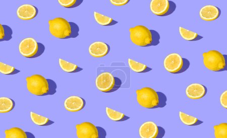 Photo for Colorful pattern of fresh ripe whole and sliced lemons. Minimal trendy sunlight fruit concept - Royalty Free Image