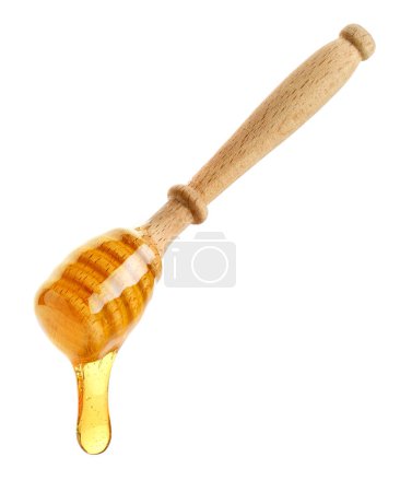 Photo for Wooden honey dipper with honey drop isolated on white background - Royalty Free Image