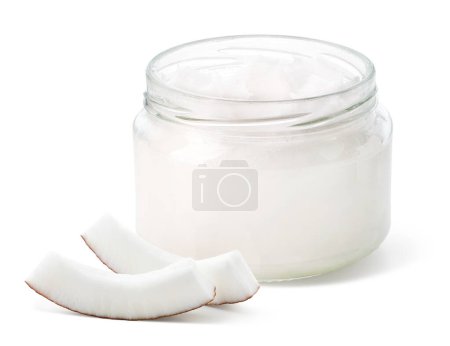 Photo for Open glass jar of coconut oil and fresh coconut pieces isolated on white background - Royalty Free Image