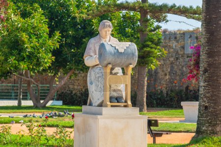 Photo for Peniche, Portugal - September 7, 2017: Sculpture in park dedicated to bobbin lacemakers - Royalty Free Image