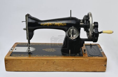 Photo for Old vintage sewing machine on white background - Royalty Free Image