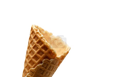 An empty waffle cone on a white background, ready to be filled with delicious ice cream 