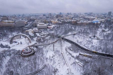 Photo for Aerial view of Kiev, Ukraine in winter. Khreshchatyi park and the Arch of Friendship of Peoples - Royalty Free Image