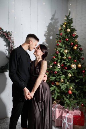 Photo for Romantic couple in love happy about being together celebrating winter holidays in good mood - Royalty Free Image
