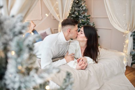Photo for Romantic couple in love happy about being together celebrating winter holidays in good mood - Royalty Free Image