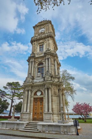 Photo for Besiktas, Istanbul - Turkey - April 24, 2017: Dolmabahce Palace and clock tower exterior view - Royalty Free Image