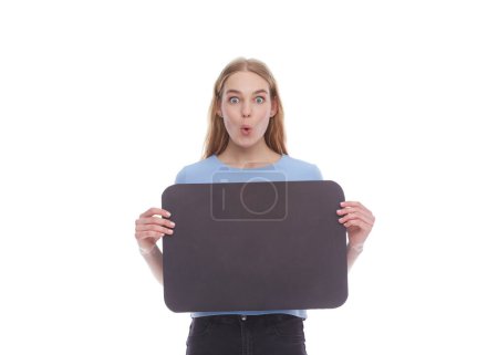 Foto de Surprised emotional woman holding signboard. Female model hold empty signboard. isolated on white - Imagen libre de derechos