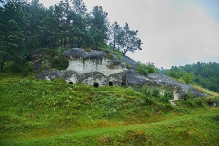 Photo for Big old cave houses from outside, rainy weather - Royalty Free Image