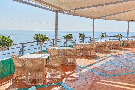 Photo for Dinner tables near sea, Beautiful details of Amalfitana at summer, Amalfi coast Italy - Royalty Free Image