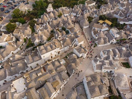 Photo for Aerial view of Alberobello, city of Trulli in Itria Valley, Puglia. Traditional Apulian dry stone huts with a conical roof in the Murge area of the Italian region of Apulia. Trulli city in south Italy - Royalty Free Image