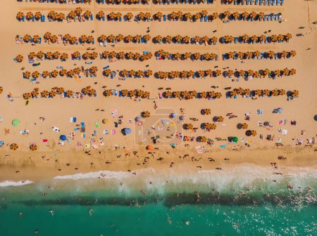 Foto de Drone aerial of beach umbrellas in the beach. Summer holidays in the sea - Imagen libre de derechos