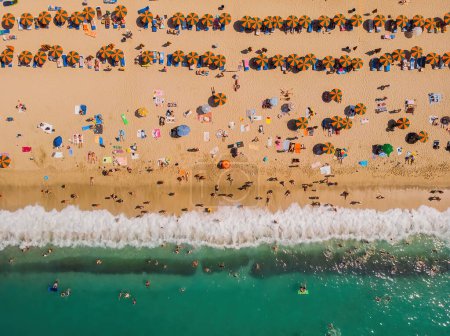 Foto de Drone aerial of beach umbrellas in the beach. Summer holidays in the sea - Imagen libre de derechos
