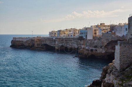 Photo for Spectacular spring cityscape of Polignano a Mare town, Puglia region, Italy, Europe. Colorful evening seascape of Adriatic sea. Traveling concept background. - Royalty Free Image