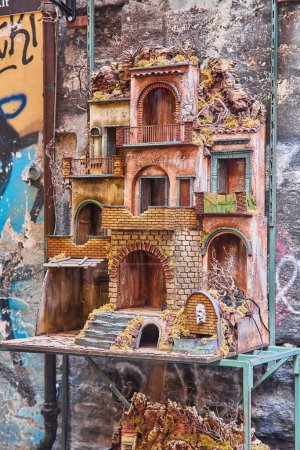 Photo for Naples, Italy - October 25, 2019: The art of Neapolitan nativity scene in San Gregorio Armeno, a famous small street in the old town of Napoli - Royalty Free Image