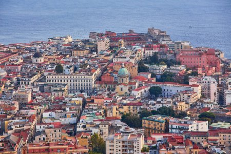 Photo for Naples, Italy evening panorama of city center coastal section with Plebiscito square and Palazzo Real visible during sunset. - Royalty Free Image