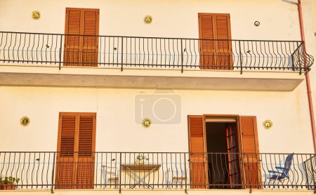 Photo for Traditional European Balcony with colorful flowers and flowerpots - Royalty Free Image