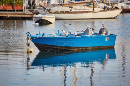 Téléchargez les photos : Bari town skyline and fishing boats - harbor in Apulia region, Italy. - en image libre de droit