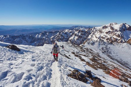 Hiking to the summit of Jebel Toubkal, highest mountain of Morocco.
