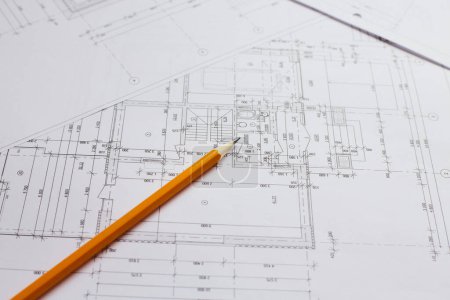 Photo for Architectural plans. construction site, pencil and blueprints. - Royalty Free Image