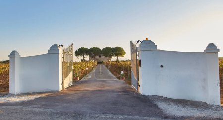 Italy, Villa entrance gate and estate Puglia