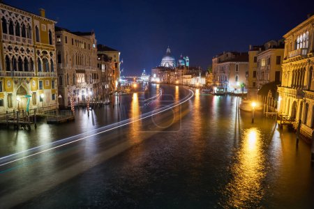 The Grand Canal illuminated at night in Venice, Italy