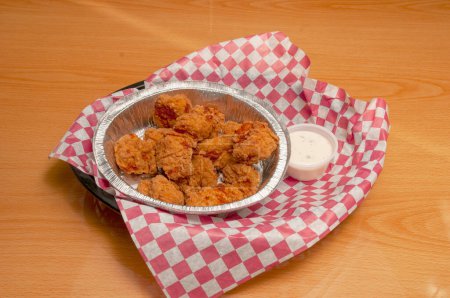 Photo for American cuisine dish known as boneless chicken wings - Royalty Free Image