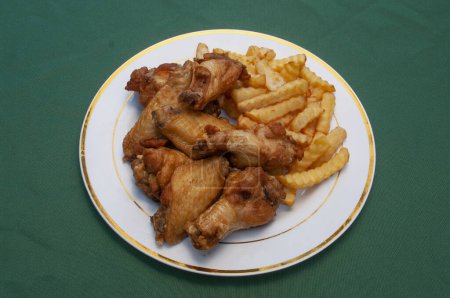 Photo for American cuisine dish known as chicken wings - Royalty Free Image