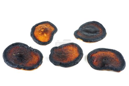 Photo for Burnt pancakes isolated on white background - Royalty Free Image