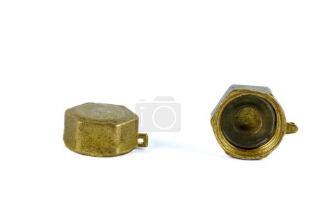 Photo for Plug stopgap nut on the pipe thread 1/2", close up plumbing fixtures on white background - Royalty Free Image