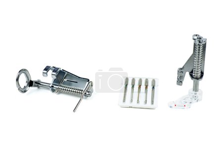 Sewing accessories for quilting: set of needles and long arms isolated on a white background