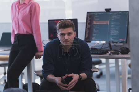 Photo for Programming. Man Working On Computer In IT Office, Sitting At Desk Writing Codes. Programmer Typing Data Code, Working On Project In Software Development Company. - Royalty Free Image