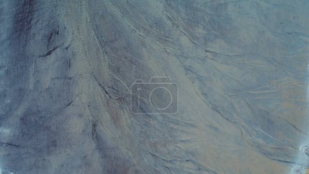 Téléchargez les photos : Top down aerial view over natural texture - abstract industrial lake water patterns. Turquoise waternature poluttion. Hi quality 4K footage. - en image libre de droit