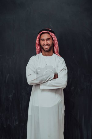 Photo for Portrait of young muslim man wearing traditional clothes. - Royalty Free Image