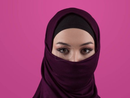 Téléchargez les photos : Modern Muslim woman wearing stylish hijab casual wear isolated on pink background. Diverse people model hijab fashion concept. High quality photo - en image libre de droit