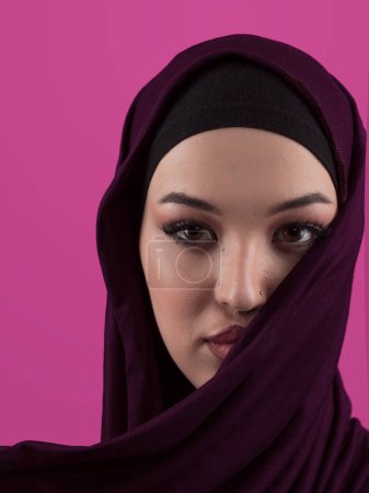 Téléchargez les photos : Modern Muslim woman wearing stylish hijab casual wear isolated on pink background. Diverse people model hijab fashion concept. High quality photo - en image libre de droit
