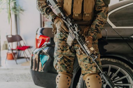 Photo for American marine corps special operations soldier preparing tactical and communication gear for action battle closeup. - Royalty Free Image