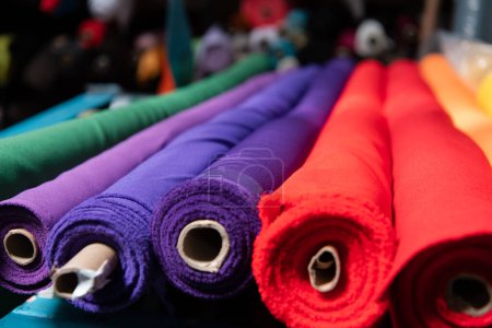 Photo for Interior of an industrial warehouse with fabric rolls samples. Small business textile colorful warehouse. High quality photo - Royalty Free Image