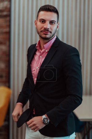 Photo for Portrait of a young businessman in a modern suit. Portrait of the company director in his office. Selective focus. - Royalty Free Image