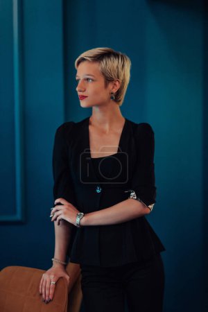 Téléchargez les photos : Blonde business woman, successful confidence on modern blue mat background. Selective focus. - en image libre de droit