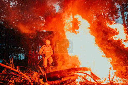 Photo for Firefighter hero in action danger jumping over fire flame to rescue and save. - Royalty Free Image