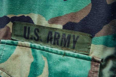 Photo for Soldier closeup on old military us army uniform. - Royalty Free Image