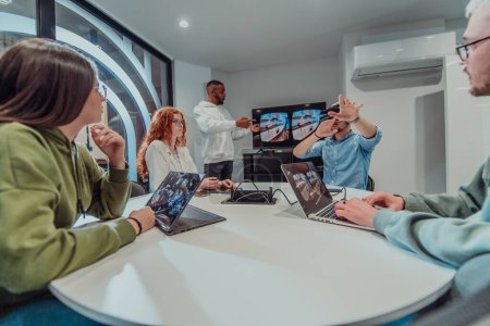 Photo for A diverse group of businessmen collaborates and tests a new virtual reality technology, wearing virtual glasses, showcasing innovation and creativity in their futuristic workspace. - Royalty Free Image