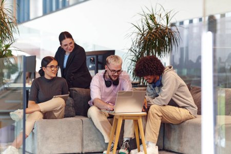 Photo for In a modern startup office, a diverse group of young professionals collaboratively tackles various business problems and challenges, surrounded by their engaged colleagues, fostering innovation and - Royalty Free Image