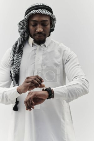Photo for Arabic entrepreneur captures a self-portrait against an isolated white background, radiating ambition, determination, and corporate charisma, embodying the essence of a successful and influential - Royalty Free Image