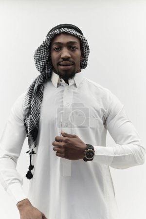 Photo for Arabic entrepreneur captures a self-portrait against an isolated white background, radiating ambition, determination, and corporate charisma, embodying the essence of a successful and influential - Royalty Free Image