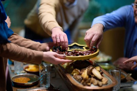 In this modern portrayal, a European Islamic family partakes in the tradition of breaking their Ramadan fast with dates, symbolizing unity, cultural heritage, and spiritual observance during the holy