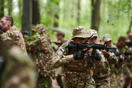 A specialized military antiterrorist unit conducts a covert operation in dense, hazardous woodland, demonstrating precision, discipline, and strategic readiness. 